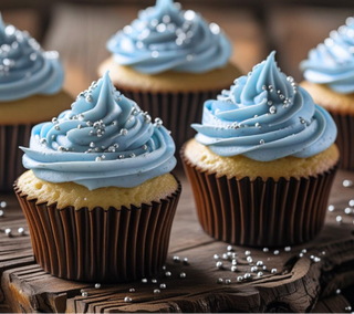 Cupcakes with blue frosting and sprinkles on a wooden surface
